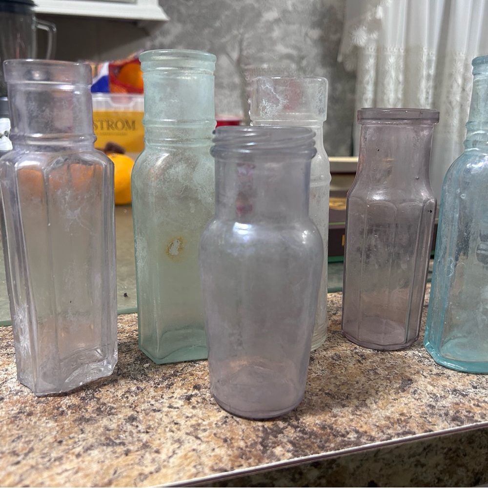 Antique 1920/1930s Heinz & condiment bottles in purple and Aqua.  All from Dig
